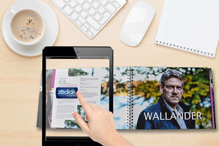 Pointing an iPad at static images in the catalogue triggers promotional videos